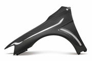 Seibon Carbon fiber fenders for 2008 -2015 Mitsubishi Lancer EVO X (10mm Wider) - image 1