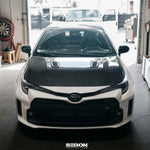 Load image into Gallery viewer, Seibon OEM-style Double-Sided carbon fiber hood for 2023-2026 Toyota GR Corolla - image 8
