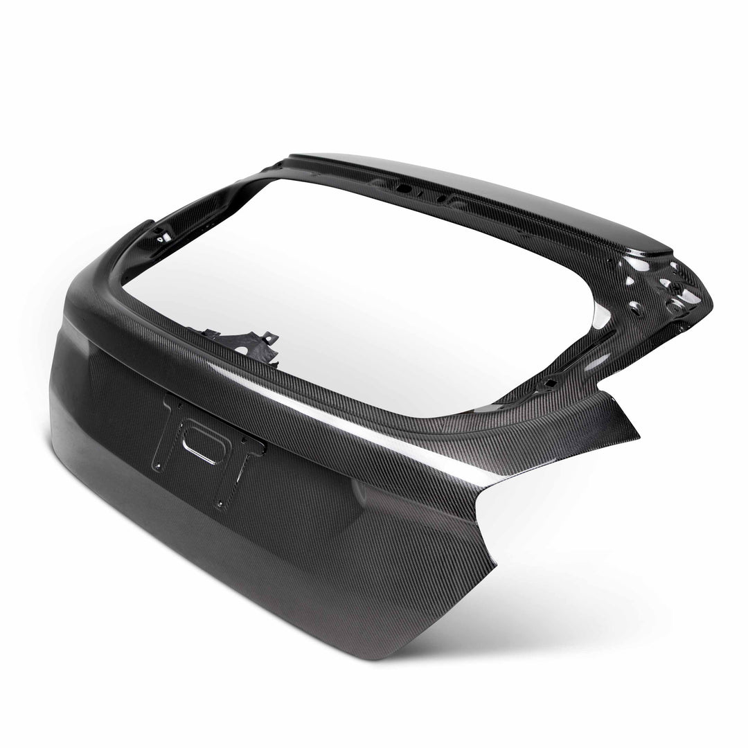 Seibon Carbon fiber trunk lid for 2015-2018 Ford Focus Hatchback - image 1
